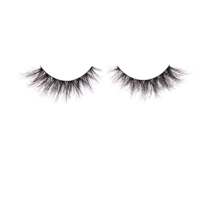 Pair of false eyelashes on a white background