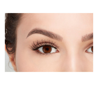 A model with an open right eye wearing Ardell Wispies showing how it looks like when it's worn