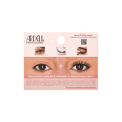 Ardell eyelash packaging with images of eyes wearing false eyelashes on a white background.