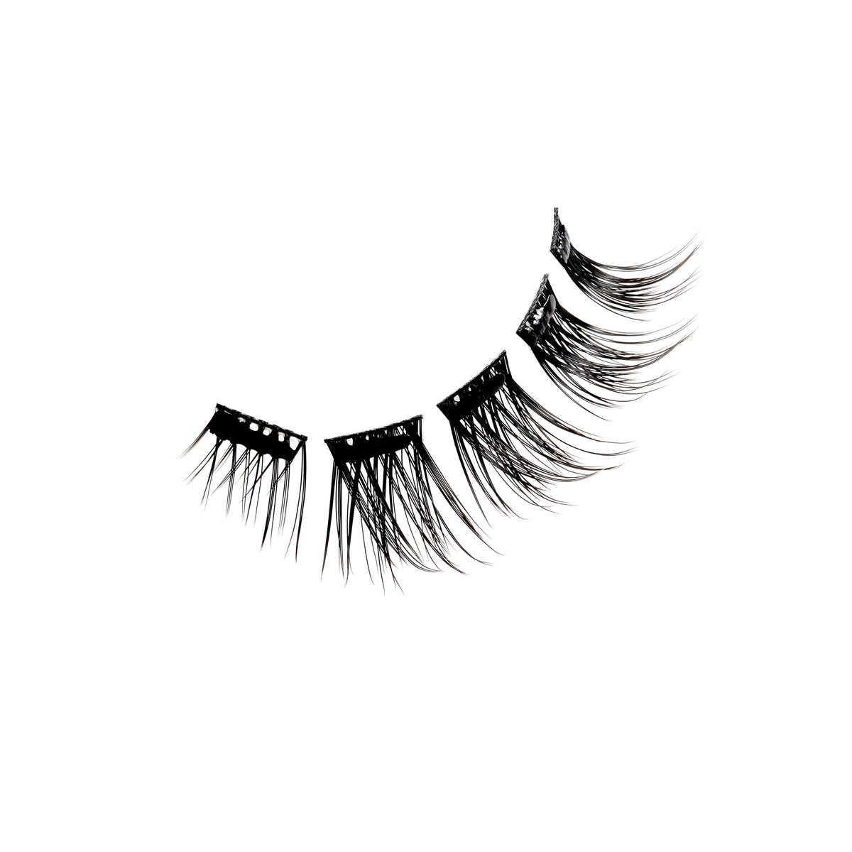 Floating set of Ardell Press-On Wispies Natural Lashes on a white background