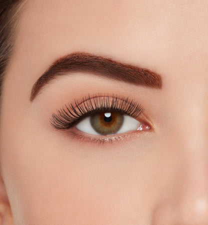 Front view of a model with wearing Ardell, X-tended Wear #105 lashes to show how they look on the eye